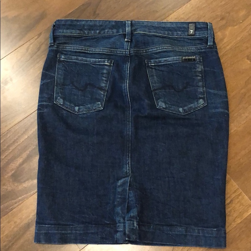 Dark denim mini skirt from Seven for all Mankind.